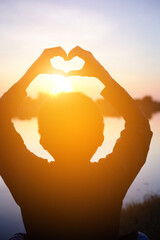boy hands holding hearts silhouette	
