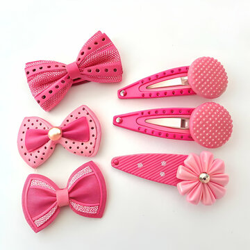 Pink hair band with blue ribben