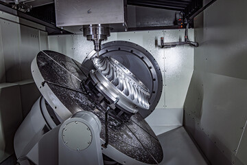 Metalworking CNC lathe milling machine. Cutting metal modern processing technology. © Andrei Armiagov