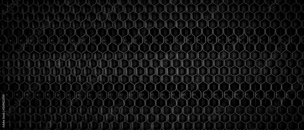 Aufkleber close up of black textured metallic background with mesh pattern for template, banner or web page