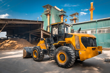 Gypsum factory sand storage and bulldozer