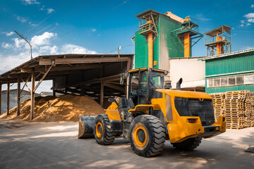 Gypsum factory sand storage and bulldozer