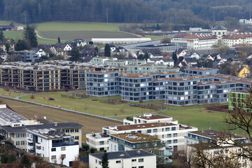 View of a modern residential area on a cloudy winter day. Town of Lenzburg, canton of Aargau, Switzerland.