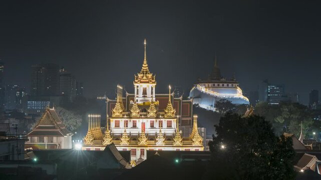 Time lapse of Wat Ratchanatdaram and Loha Prasat Metal Castle at sunset, landmark and famous place of Bangkok city, Thailand, Footage timelapse