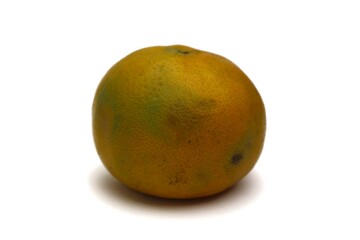 Fototapeta premium Close-up of a Fresh and Colorful Orange Fruit Isolated on White Background