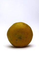 Close-up of a Fresh, Organic Mandarin Orange against a White Background