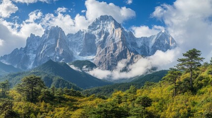 Obraz premium The dramatic cliffs and glaciers of Jade Dragon Snow Mountain, with clouds swirling around the jagged peaks and rugged terrain beneath