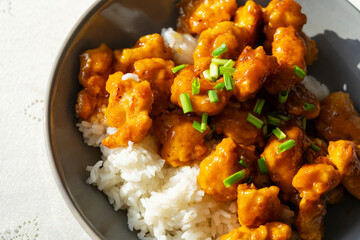favorite Asian delicacy orange peel chicken. Including: cornmeal breading, soy sauce, garlic, ginger, brown sugar, wine vinegar, green onion
