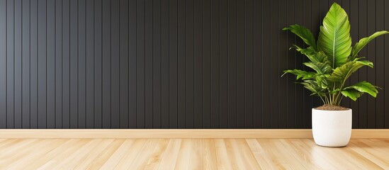 Matte black wall with a vertical panel design, juxtaposed with a light colored parquet floor for a striking modern contrast.