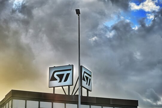 ST Microelectronics company logo on plant facade under cloudy sky Catania Italy February 4 2025