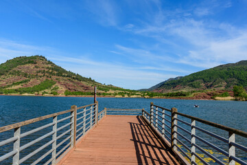 Obraz premium The pontoon of Lake Salagou in Europe, France, Occitanie, Herault, Clermont l Herault, in summer, on a sunny day.