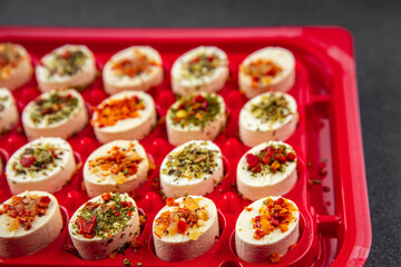 cheese appetizer soft cheese with herbs and tomatoes pieces fresh tasty food dish delicious gourmet food background on the table rustic food top view copy space