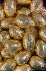 background Easter egg golden foil sweet top view chocolate