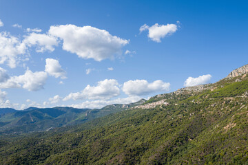 The countryside around the town of Baunei in Europe, Italy, Sardinia, Baunei, in summer, on a sunny...