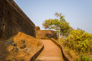 The walking path in the fort at Bekal in Asia, India, Kerala, Bekal, in summer, on a sunny day.
