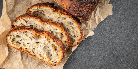 Bread cereal sunflower, chia, flax seed, cut oats fresh tasty food dish delicious gourmet food background on the table rustic food top view copy space vegetarian and vegan food