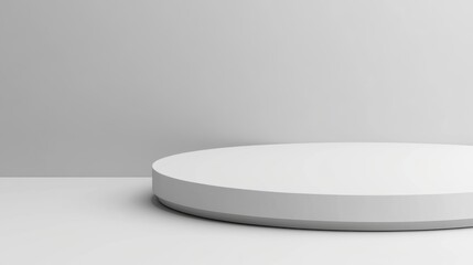 A minimalist white stand with clean edges, placed on a white surface.