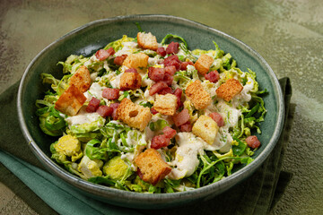 Brussels sprouts Caesar salad, with bacon and croutons, healthy food, homemade, no people,