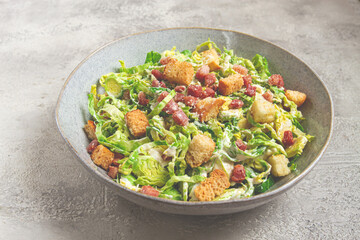 Brussels sprouts Caesar salad, with bacon and croutons, healthy food, homemade, no people,