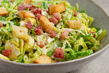 Brussels sprouts Caesar salad, with bacon and croutons, healthy food, homemade, no people,