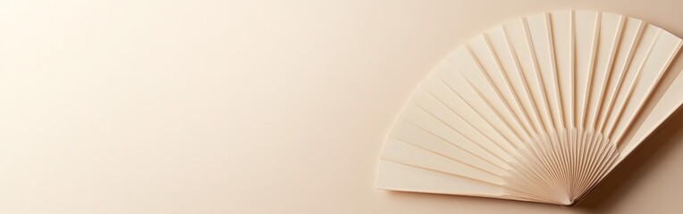 Decorated Fan With Vibrant Colors and Artistic Elements Set Against a Soft Textured Background