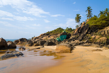 Rocks on Samudra Beach in Kovalam in Asia, India, Kerala, Kovalam, in summer, on a sunny day.