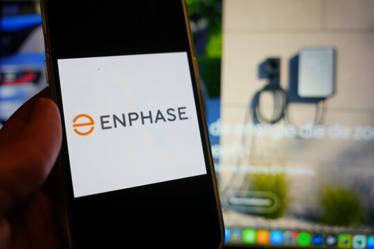 Roosendaal, The Netherlands - February 16, 2025:A mobile phone displaying the logo of Enphase Energy, with the company website in the background..