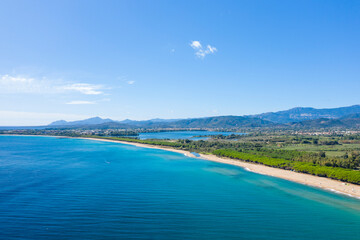 The sandy beach in Lotzorai in Europe, Italy, Sardinia, Lotzorai, in summer, on a sunny day.