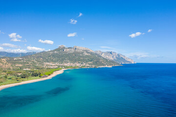 Obraz premium The sandy beach in Lotzorai in Europe, Italy, Sardinia, Lotzorai, in summer, on a sunny day.