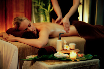 Caucasian woman customer enjoying relaxing anti-stress spa massage and pampering with beauty skin...