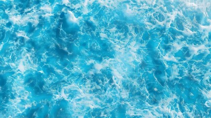 Obraz premium Aerial View of Vibrant Blue Ocean Waves With White Seafoam Patterns