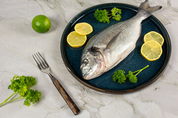 sea bream fish with lemon slices