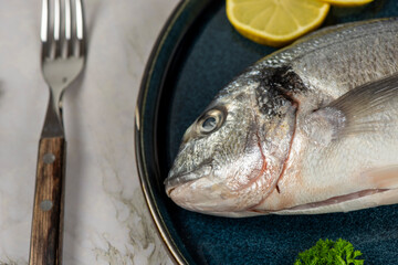 sea bream fish with lemon slices
