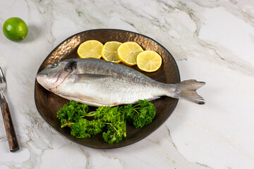 sea bream fish with lemon slices