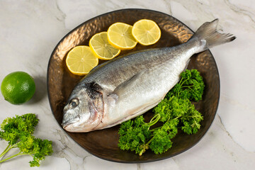 sea bream fish with lemon slices