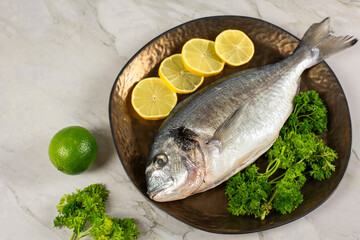 sea bream fish with lemon slices