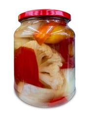 Pickled chopped vegetables in glass jar with red cap isolated