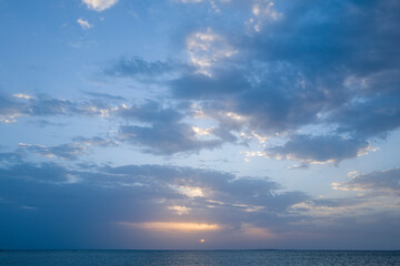 Sunset over the sea towards Oristano in Europe, Italy, Sardinia, Oristano, in summer, on a sunny day.