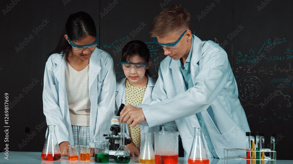 Poster smart girl pour colored solution in to beaker while diverse student excited about doing experiment. 