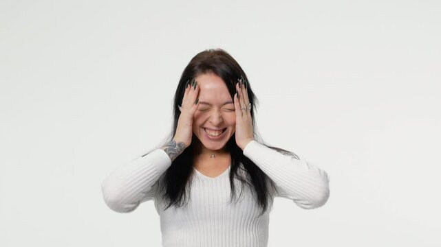 Excited woman casual holding hand shocked surprised sale product with copy space over white background. Cheerful young girl emotion amazed screaming wow something on isolated. Shopping online.