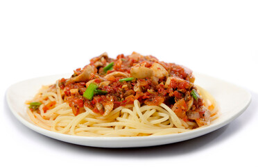 A whole plate of spaghetti bolognese isolated on white
