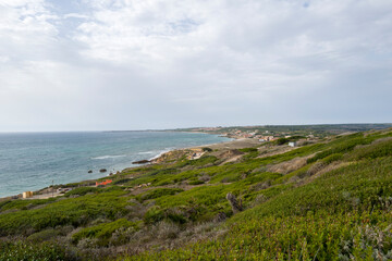 Naklejka premium The archaeological site of Tharros in Cabras in Europe, Italy, Sardinia, Cabras, in summer, on a sunny day.