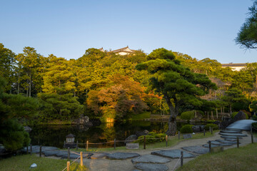 Obraz premium The view of the castle from Koko En Garden in Himeji in Asia, Japan, Kansai, Himeji, in summer, on a sunny day.