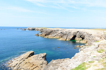 The rocks on the Beg-An-Aud point in Saint-Pierre-Quiberon in Europe, France, Brittany, Morbihan, Saint Pierre Quiberon, in summer, on a sunny day.