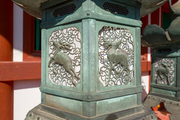 The outdoor lanterns of Kasuga Taisha Shrine in Nara in Asia, Japan, Kansai, Nara, in summer on a...