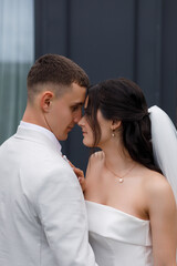 couple standing facing each other.