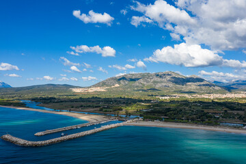 The entrance to the marina in Orosei in Europe, Italy, Sardinia, Orosei, in summer, on a sunny day.