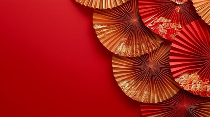 Elegant Red and Gold Paper Fan Decorations on Solid Red Background
