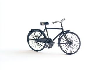 Obraz premium A detailed miniature bicycle resting on a smooth surface for creative display at home isolated on transparent background