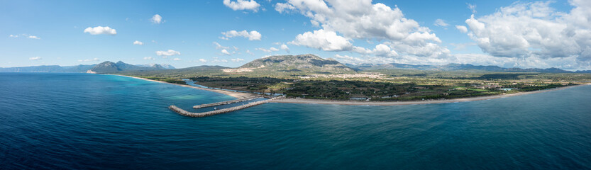 Fototapeta premium The panorama of the beach Spiaggia Marina di Orosei in Europe, Italy, Sardinia, Orosei, in summer, on a sunny day.